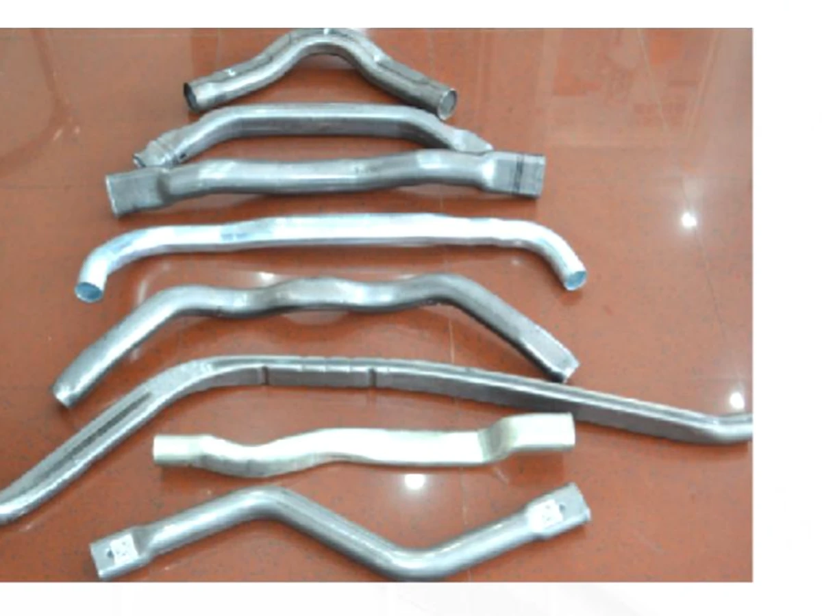 Batch of shaped automotive tubes from the JAYU hydroforming product catalog