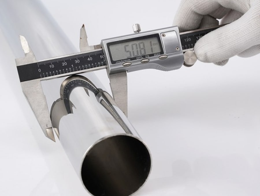Vernier caliper checking stainless steel tube outside diameter